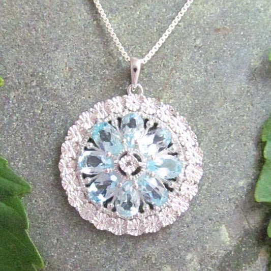 Blue Topaz & White Diamond Flower Pendant